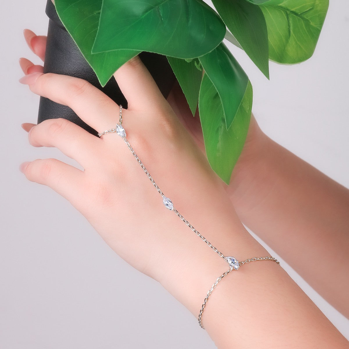 Minimalist fingerless bracelet in ultra-glamorous marquise-cut zircon
