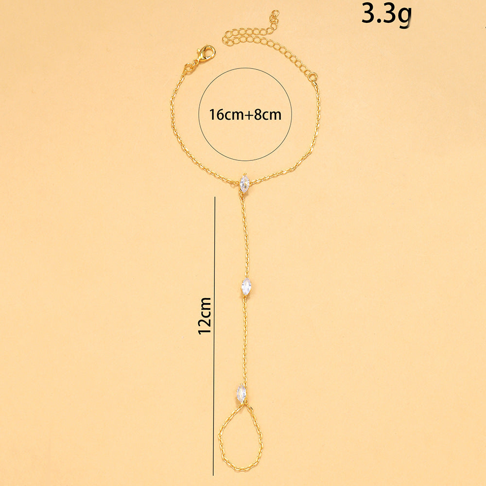 Minimalist fingerless bracelet in ultra-glamorous marquise-cut zircon