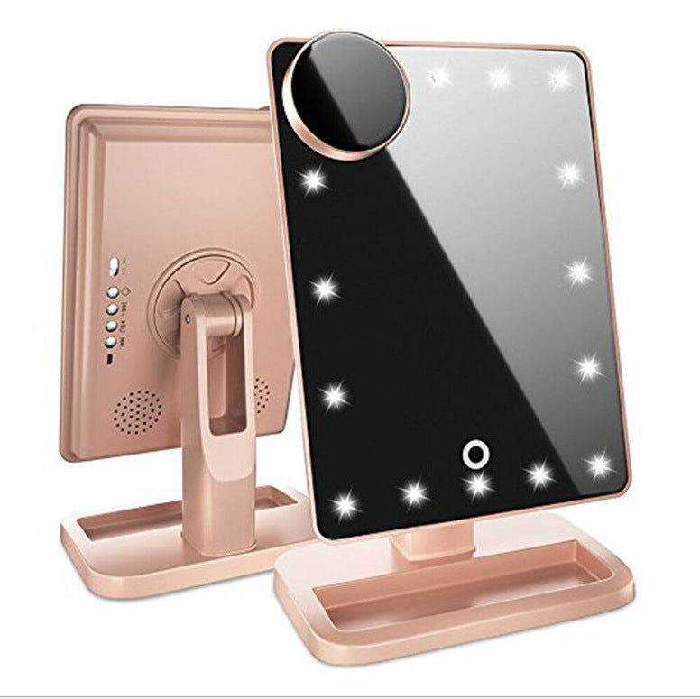 Touchscreen makeup mirror with 20 LED lights, Bluetooth music speaker, 10X magnifying mirrors, and lights.